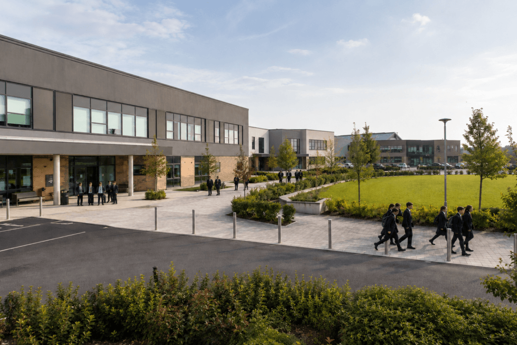 Modern school and academy estate with connected buildings and landscaped grounds